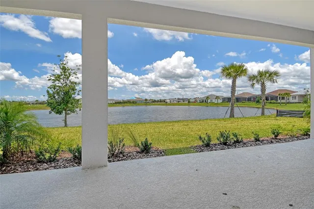 a view of a park with an ocean view
