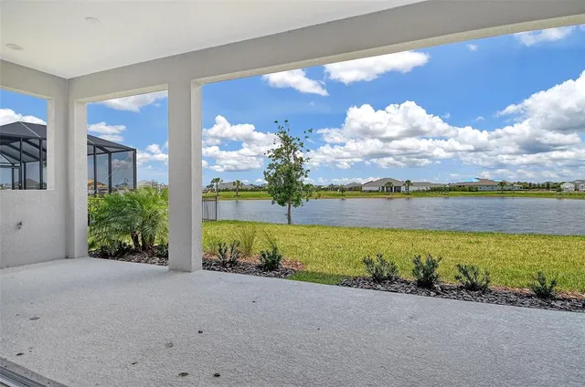 a view of a lake with a garden