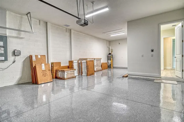 a view of a lake with a house in the background