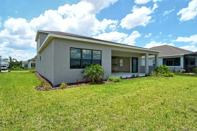 a view of a lake with a yard