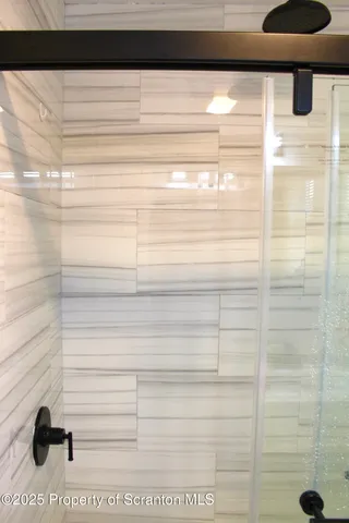 a bathroom with a toilet and a sink