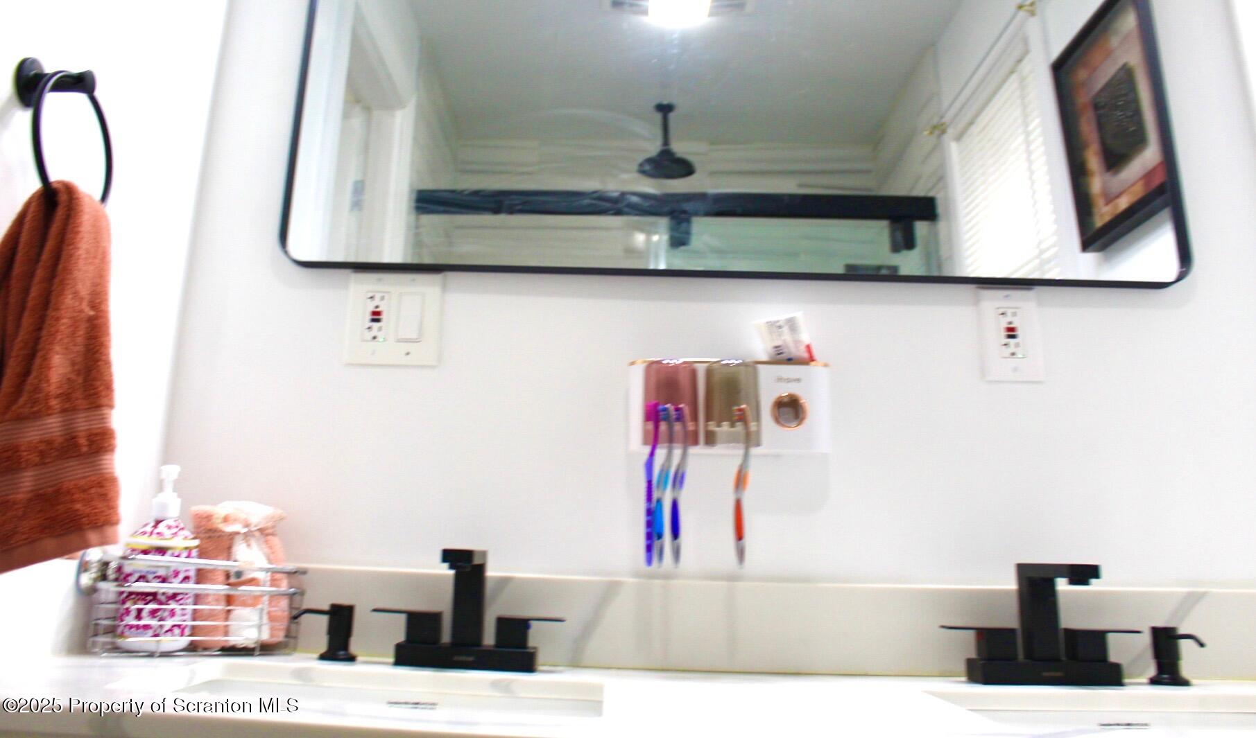 260 East Broad Street Nanticoke, PA 18634 - Photo 18 of 19 a bathroom with a sink and a mirror