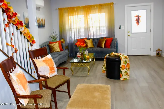 a living room with furniture and a couch