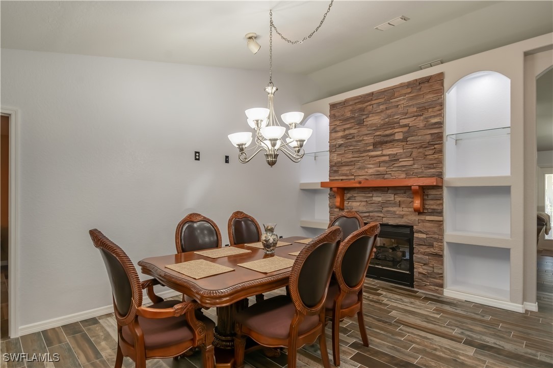236 Mastadon Drive Inglis, FL 34449 - Photo 17 of 21 a dining room with furniture and chandelier