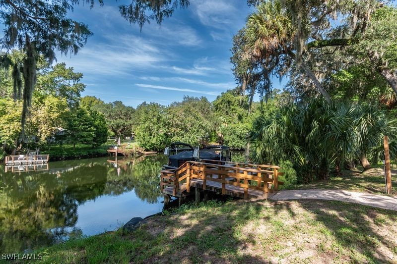 236 Mastadon Drive Inglis, FL 34449 - Photo 10 of 21 a small yard with lake view