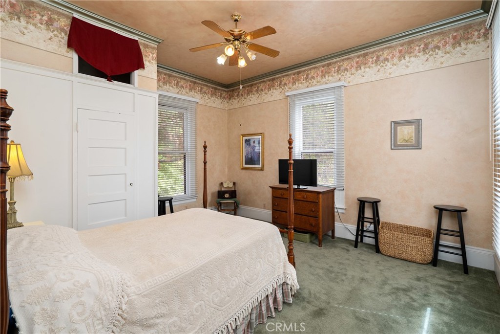 1803 Pine Street Paso Robles, CA 93446 - Photo 11 of 18 a spacious bedroom with a bed and a desk