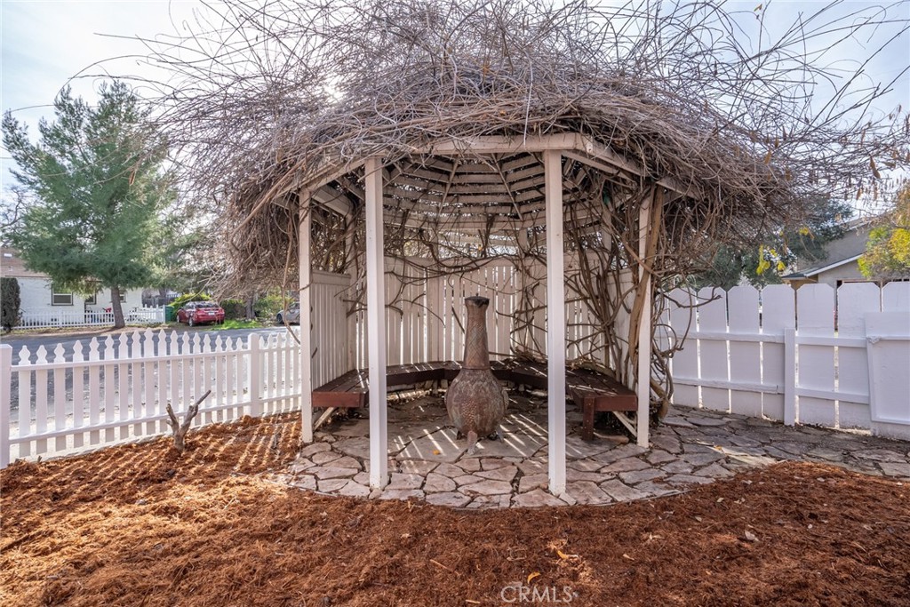 1803 Pine Street Paso Robles, CA 93446 - Photo 14 of 18 a view of a house with wooden fence