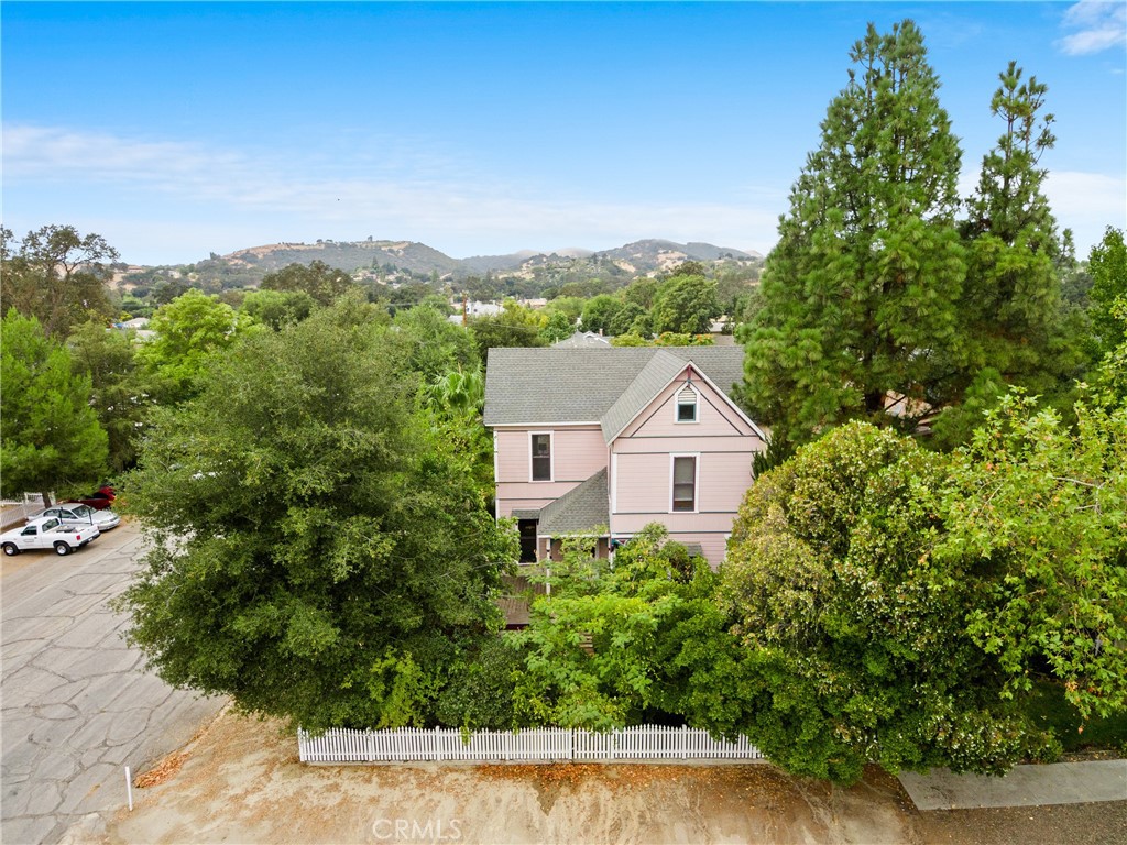 1803 Pine Street Paso Robles, CA 93446 - Photo 2 of 18 an aerial view of house with yard and trees in the background