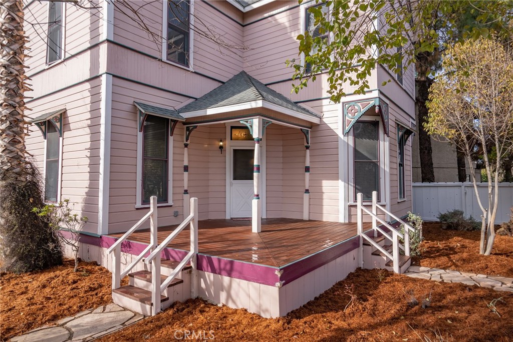 1803 Pine Street Paso Robles, CA 93446 - Photo 3 of 18 a view of a chairs with a bench in front of house