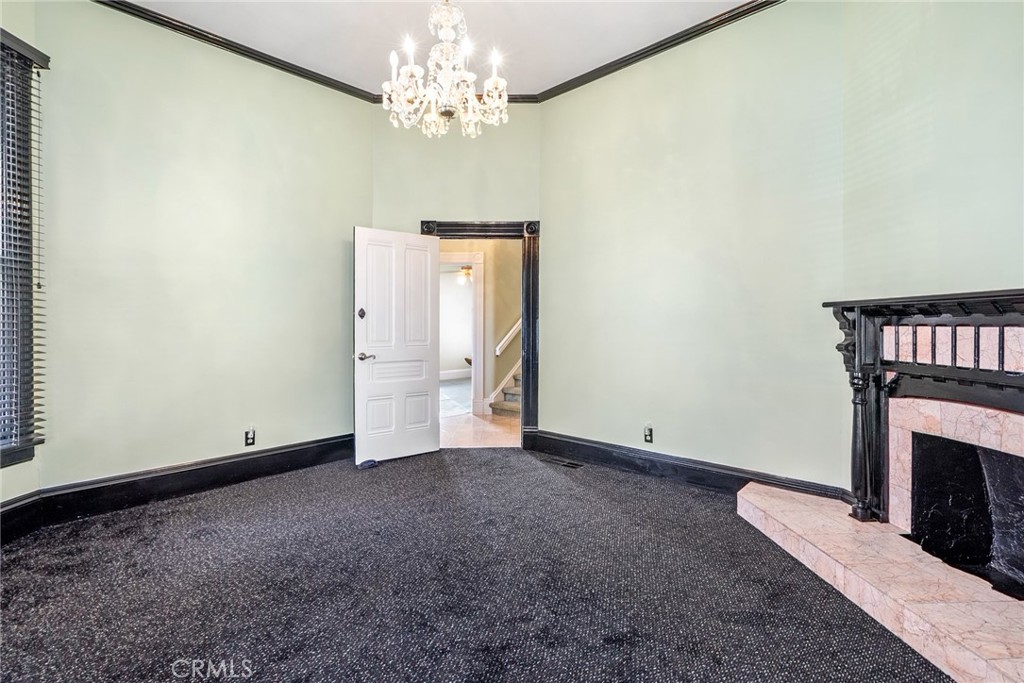 1803 Pine Street Paso Robles, CA 93446 - Photo 5 of 18 an empty room with a fireplace