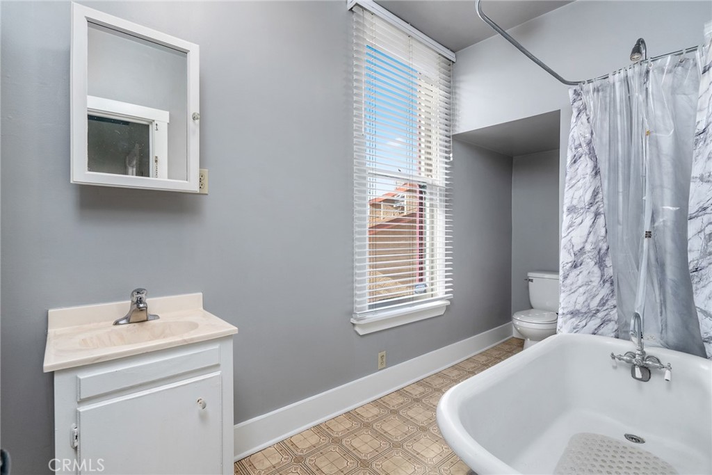 1803 Pine Street Paso Robles, CA 93446 - Photo 10 of 18 a bathroom with a sink and a bathtub