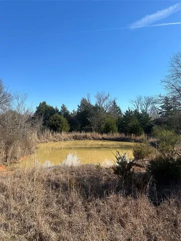 a view of a lake with outdoor space