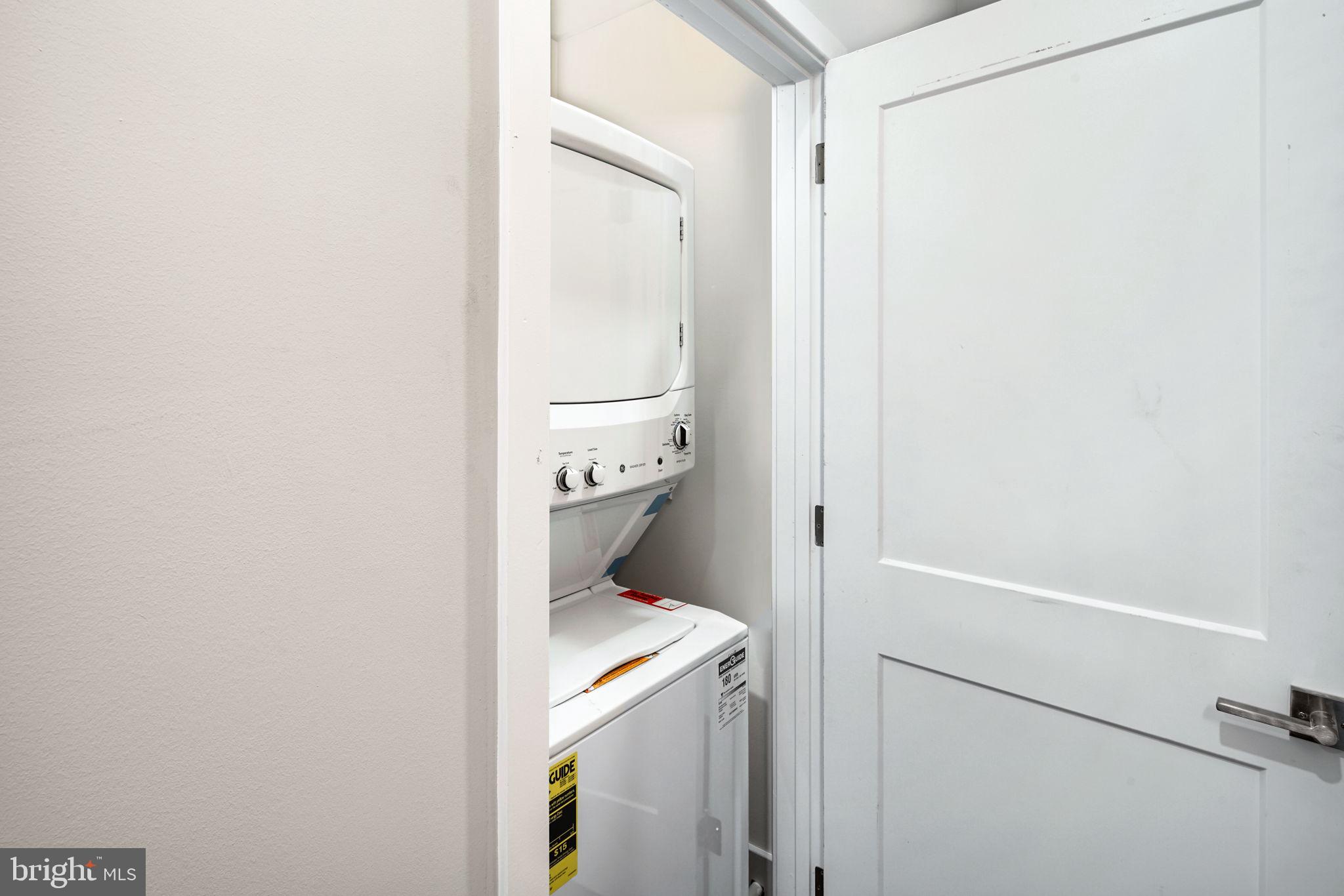 1527-29 Ridge Avenue, Unit 3A Philadelphia, PA 19130 - Photo 29 of 33 a utility room with dryer and washer