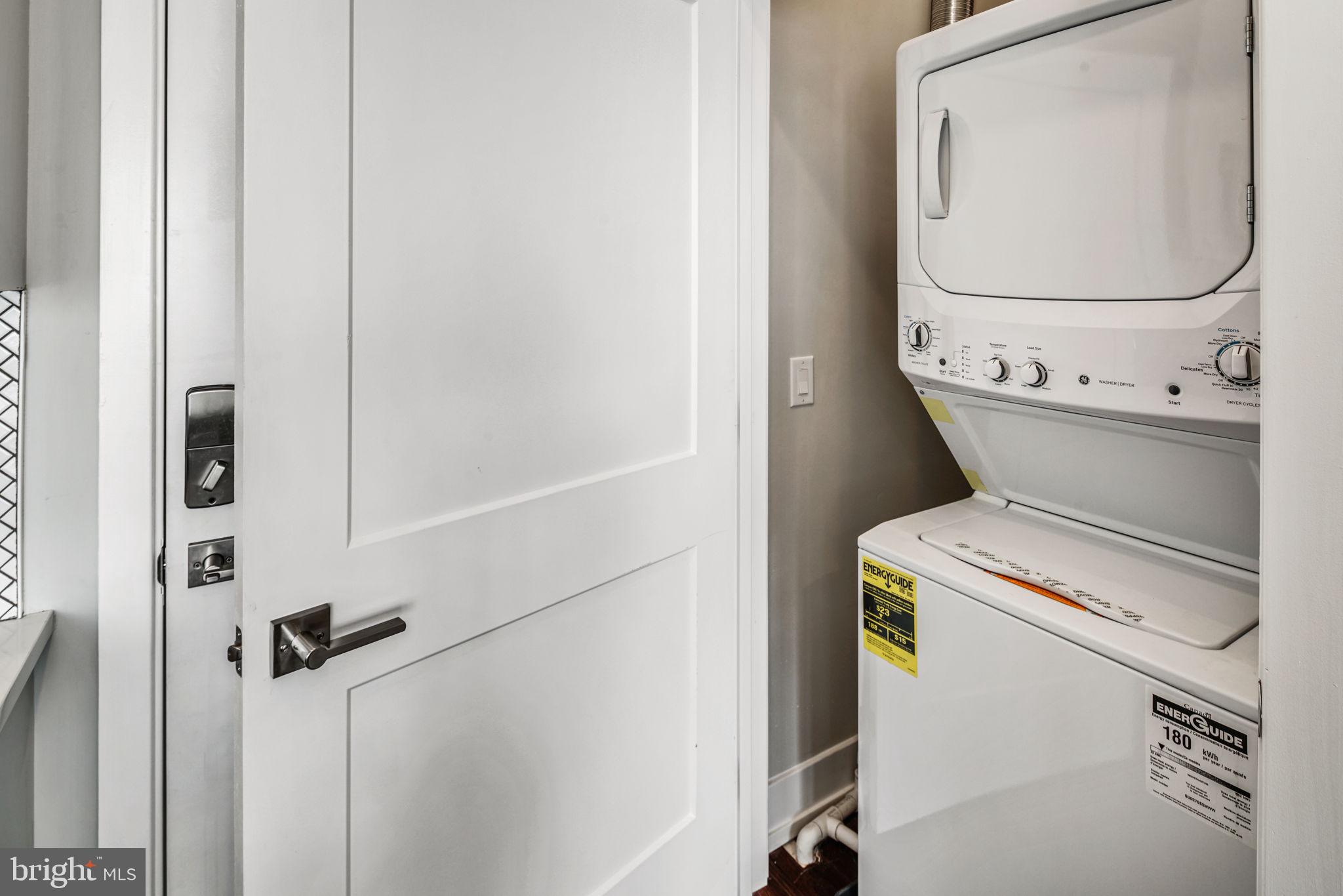 1527-29 Ridge Avenue, Unit 3A Philadelphia, PA 19130 - Photo 30 of 33 a utility room with dryer and washer
