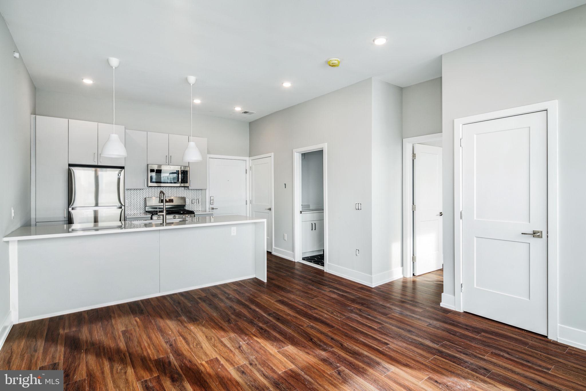 1527-29 Ridge Avenue, Unit 3A Philadelphia, PA 19130 - Photo 6 of 33 a view of kitchen with wooden floor