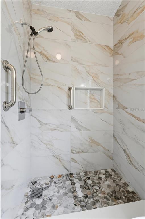 1798 Fox Hill Drive Lakeland, FL 33810 - Photo 18 of 41 a bathroom with a shower