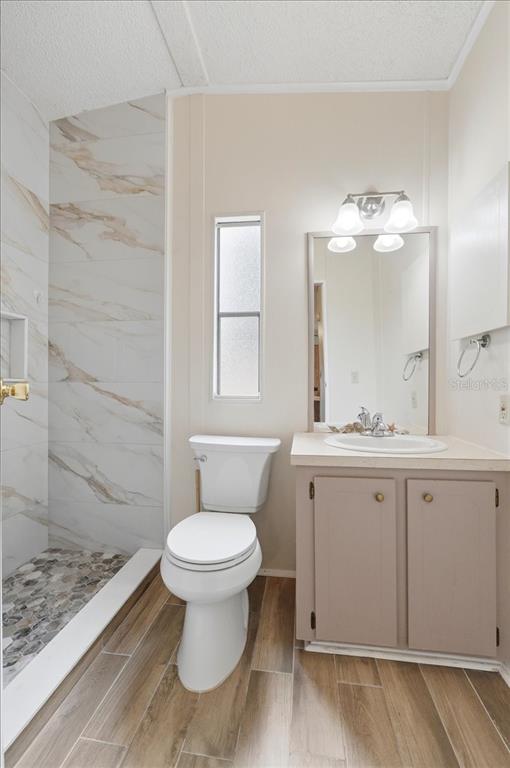 1798 Fox Hill Drive Lakeland, FL 33810 - Photo 19 of 41 a bathroom with a toilet sink and mirror