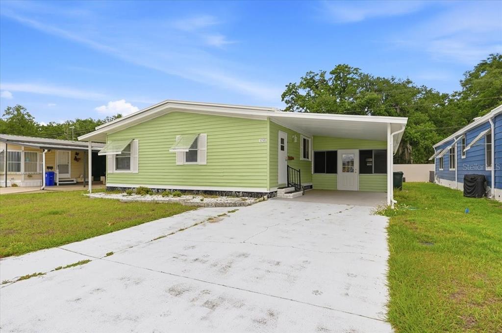 1798 Fox Hill Drive Lakeland, FL 33810 - Photo 2 of 41 front view of a house with a yard