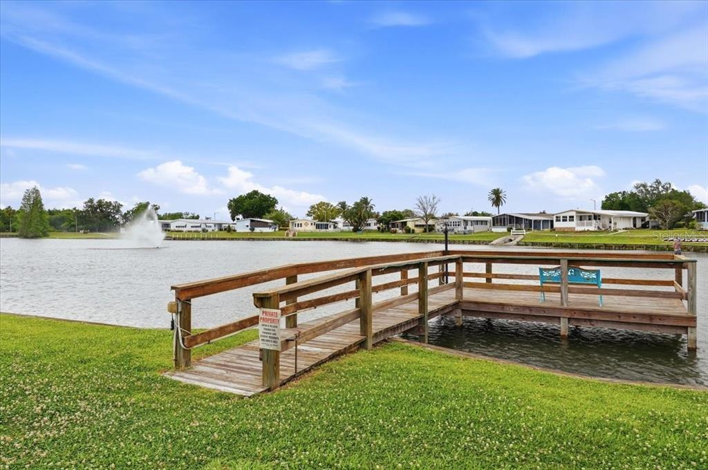 1798 Fox Hill Drive Lakeland, FL 33810 - Photo 30 of 41 a view of a lake with houses in the back