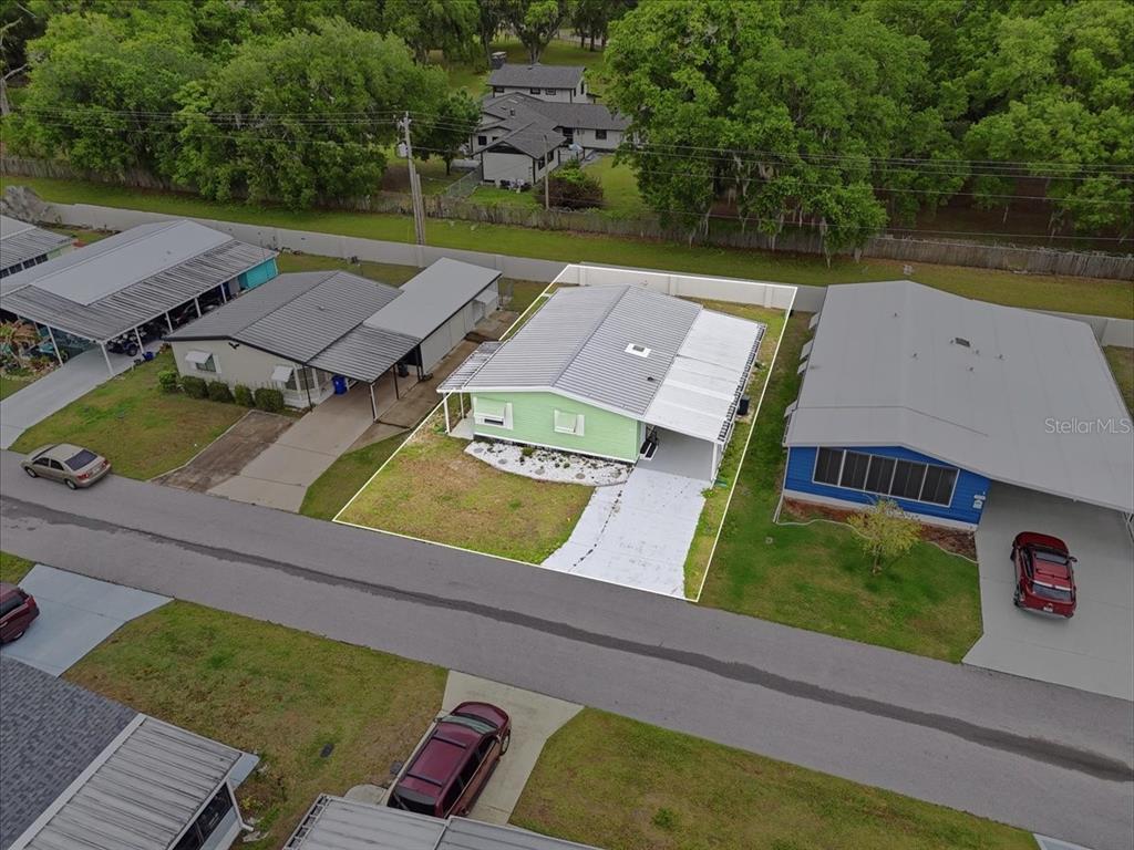 1798 Fox Hill Drive Lakeland, FL 33810 - Photo 40 of 41 an aerial view of a house with pool outdoor seating and yard