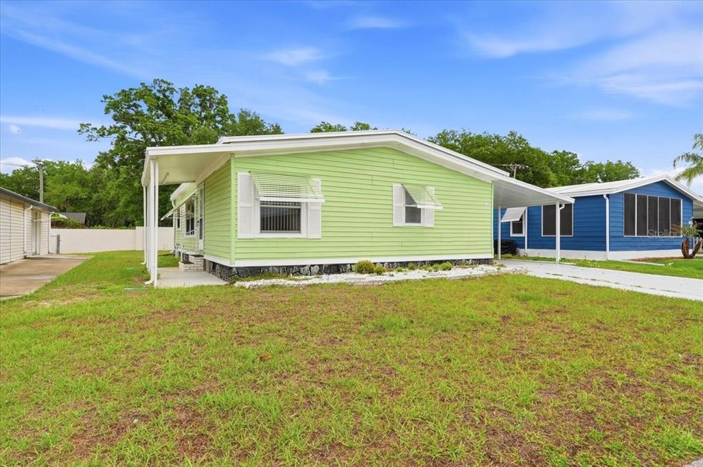 1798 Fox Hill Drive Lakeland, FL 33810 - Photo 5 of 41 a house view with swimming pool and garden space
