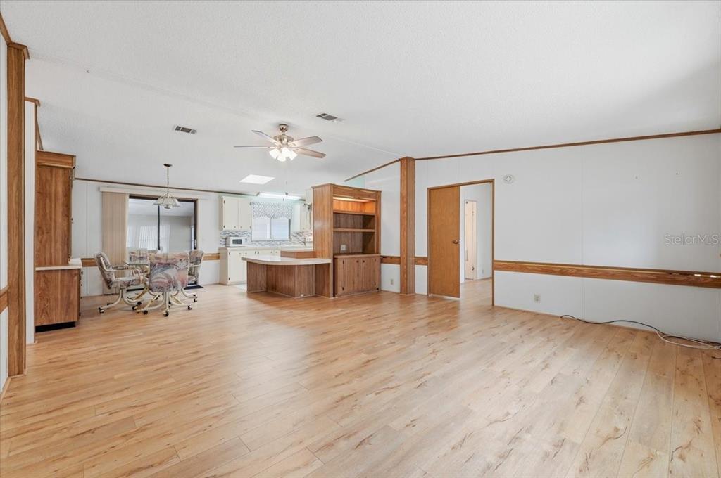 1798 Fox Hill Drive Lakeland, FL 33810 - Photo 10 of 41 a living room with furniture and a wooden floor
