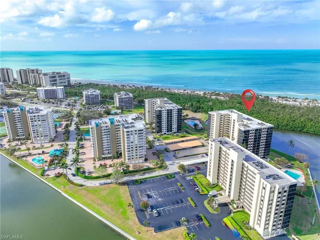 a view of a city with an ocean view