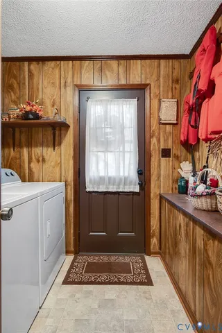 a kitchen with a stove a sink and a refrigerator