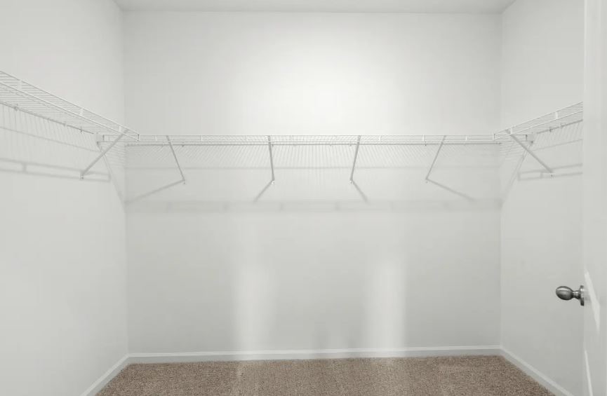 1309 Morris Loop San Marcos, TX 78666 - Photo 15 of 18 Walk-in Closet in Primary Bedroom - Representative Photo