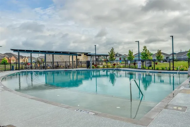 a view of a lake with a city