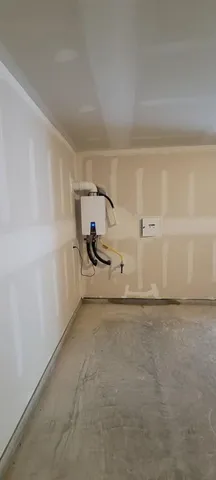 a view of a room with racks on the wall