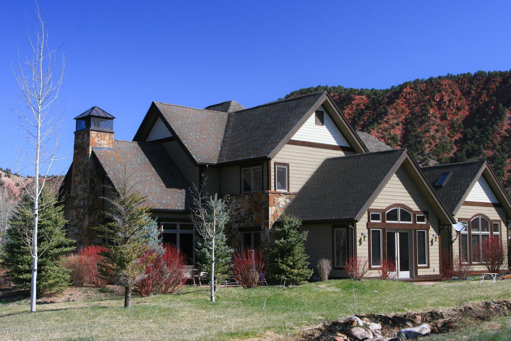 210 Diamond A Ranch Road Carbondale, CO 81623 - Photo 1 of 14 a front view of a house with a yard