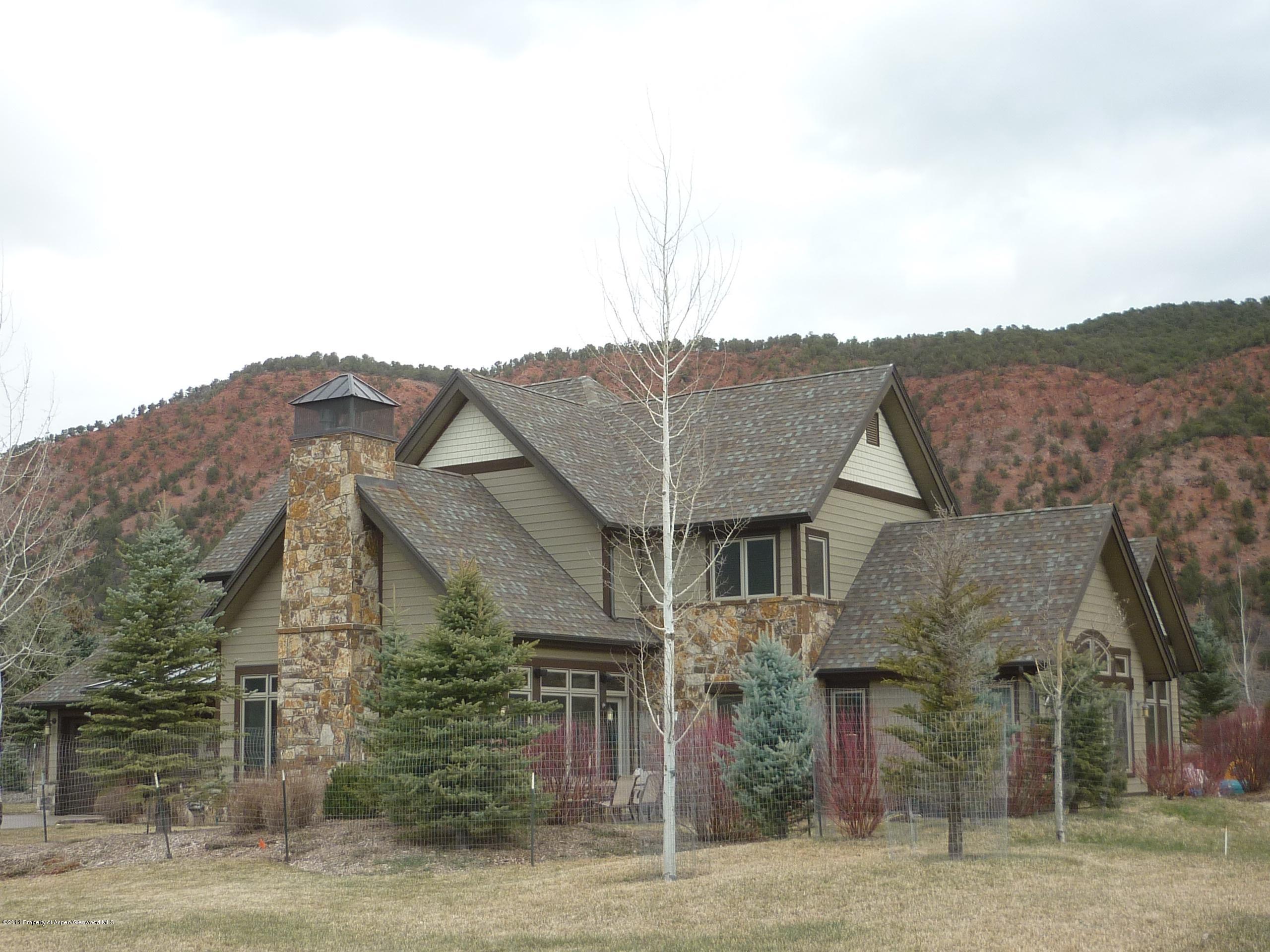 210 Diamond A Ranch Road Carbondale, CO 81623 - Photo 9 of 14 a view of a big house with a mountain