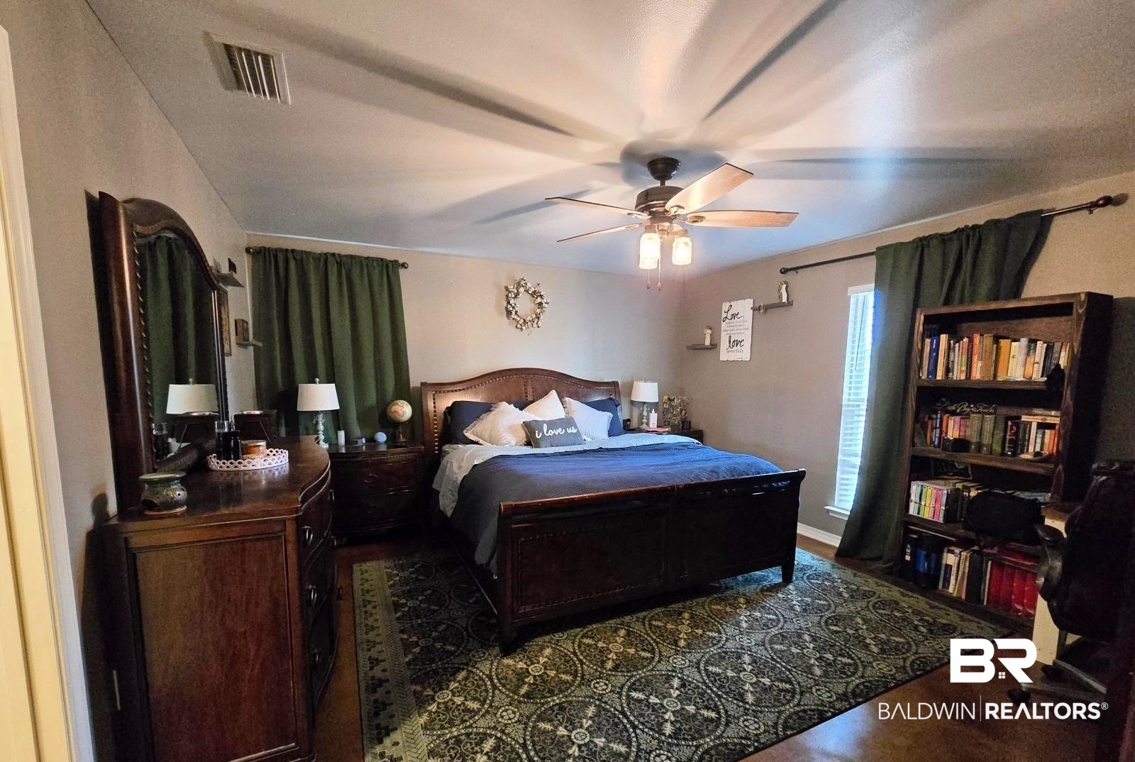 52041 Robert White Road Bay Minette, AL 36507 - Photo 16 of 16 Bedroom with ceiling fan and dark wood-type flooring