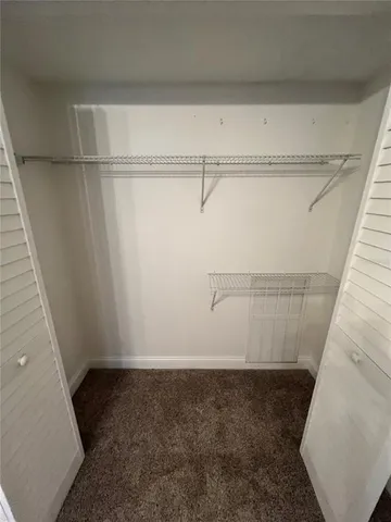 a view of a room with racks on the wall