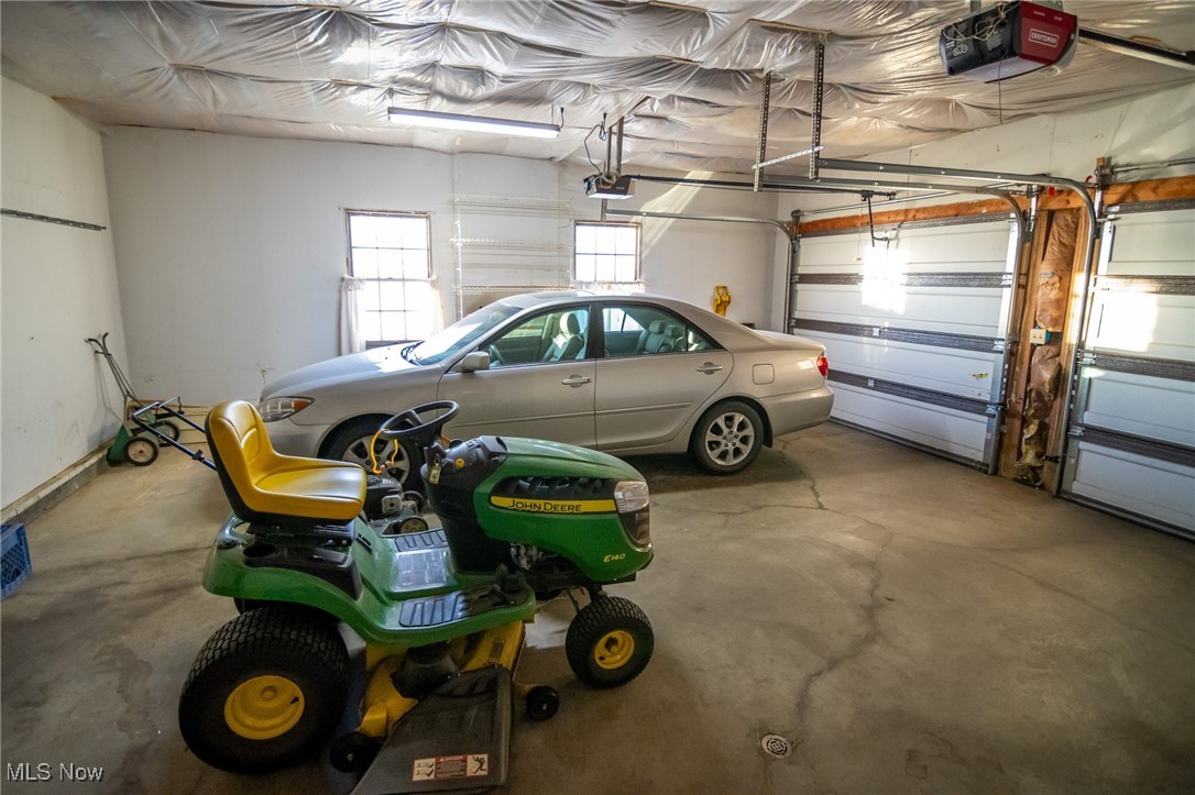 54346 Bracken Road Bridgeport, OH 43912 - Photo 34 of 50 Garage with a garage door opener