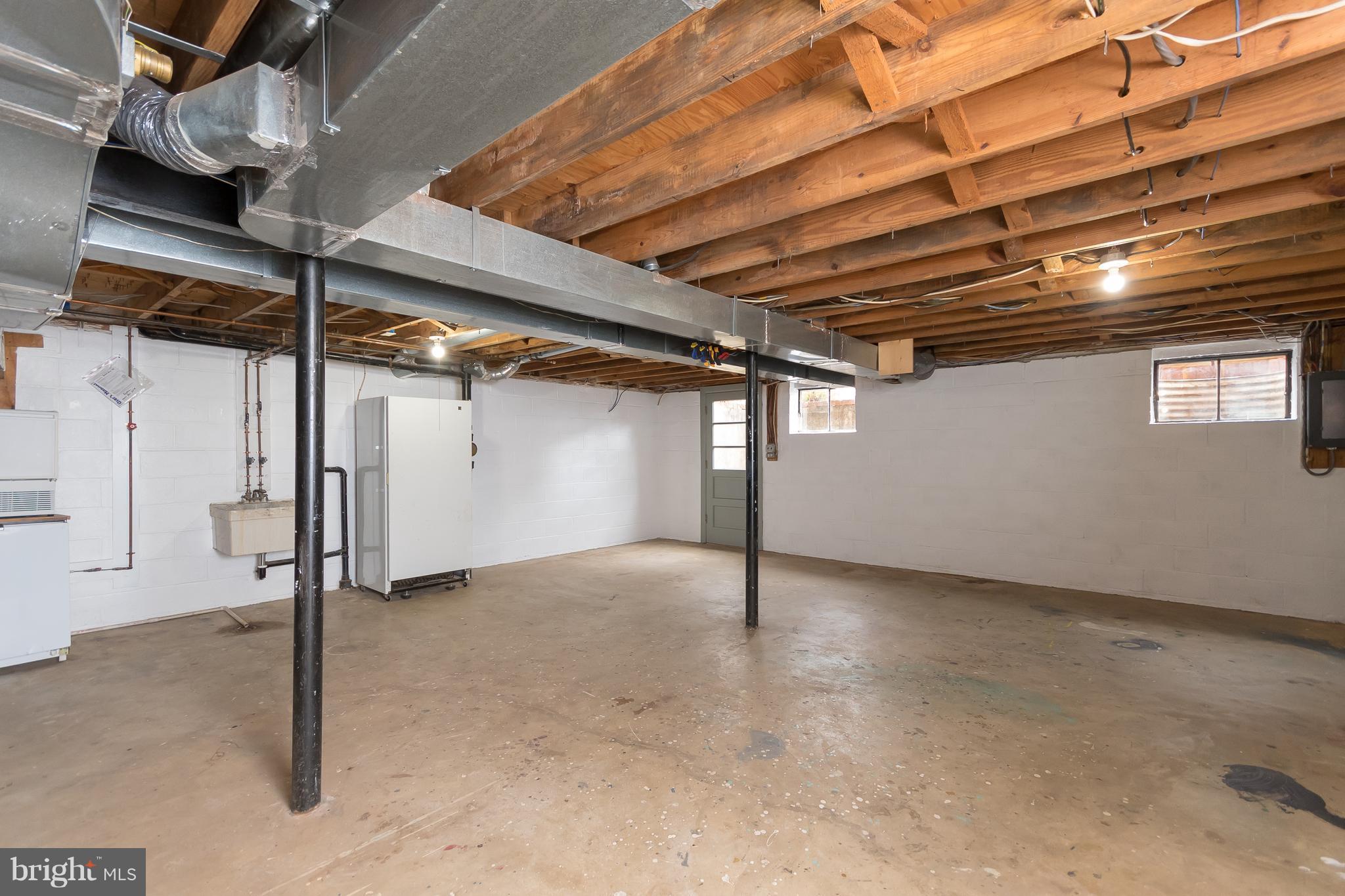 4921 Cove Road Fairfax, VA 22032 - Photo 25 of 30 Walk-Up Unfinished Basement-Endless Possibilities