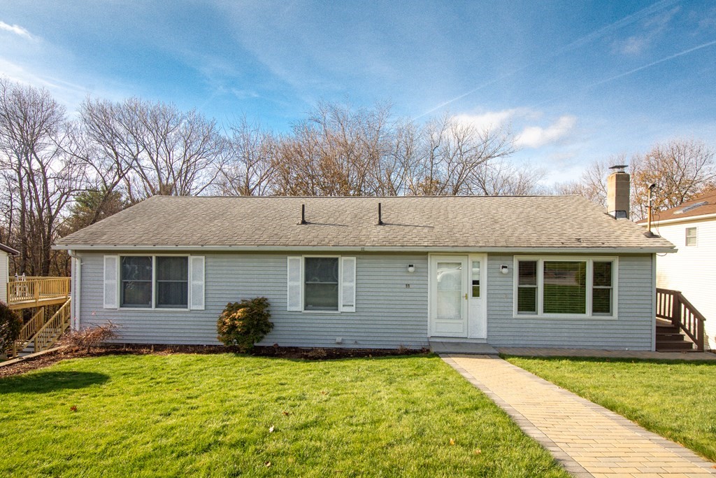 55 Wrentham Road Worcester, MA 01602 - Photo 1 of 30 a view of a house with a backyard