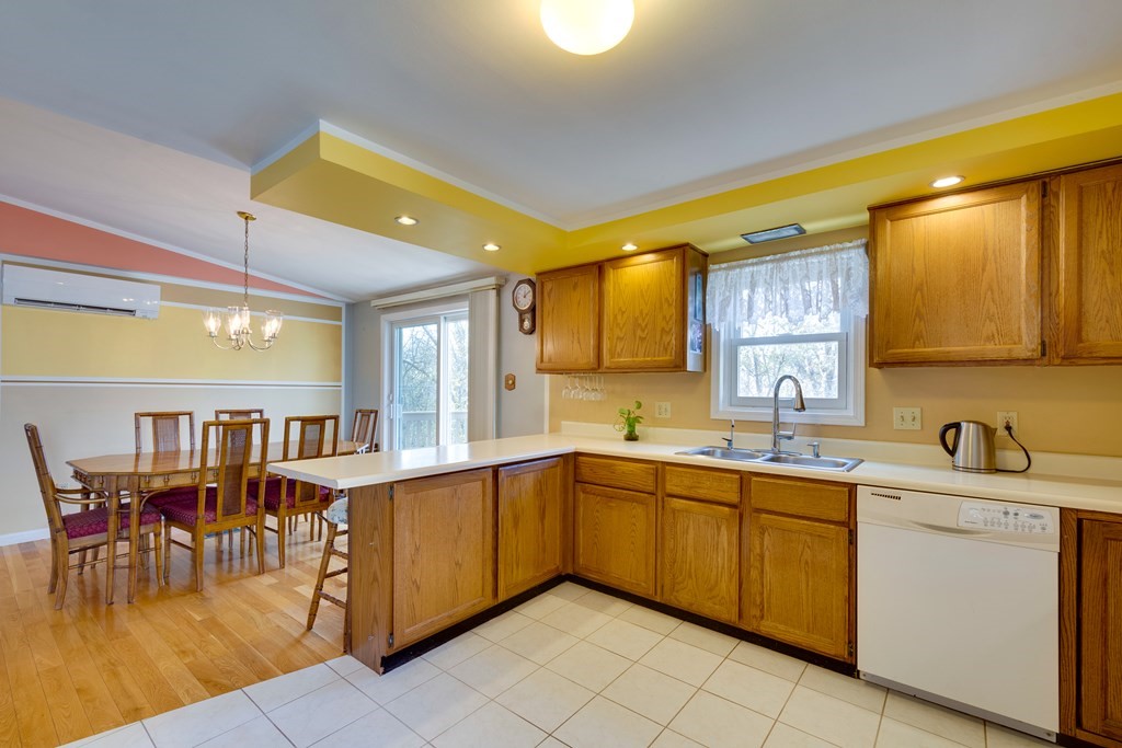 55 Wrentham Road Worcester, MA 01602 - Photo 12 of 30 a kitchen with a sink and cabinets