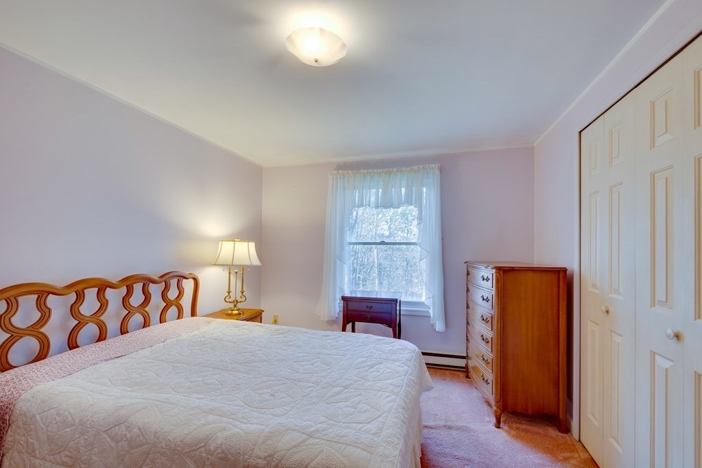55 Wrentham Road Worcester, MA 01602 - Photo 18 of 30 a bedroom with a bed and a window