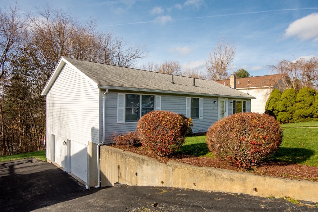 55 Wrentham Road Worcester, MA 01602 - Photo 3 of 30 a front view of a house with garden
