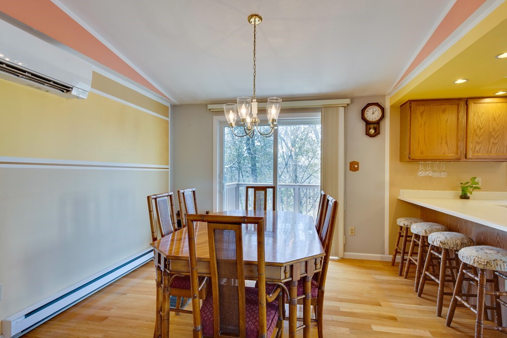 55 Wrentham Road Worcester, MA 01602 - Photo 7 of 30 a view of a dining room with furniture window and wooden floor