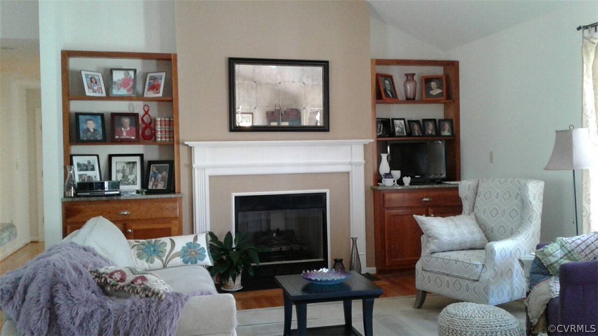 1863 Buffalo Road Dillwyn, VA 23936 - Photo 2 of 27 a living room with furniture and a fireplace