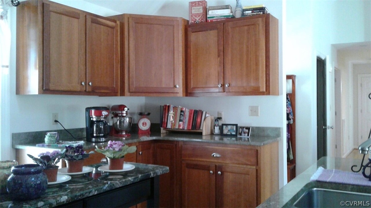 1863 Buffalo Road Dillwyn, VA 23936 - Photo 5 of 27 a kitchen with stainless steel appliances granite countertop a refrigerator and stove