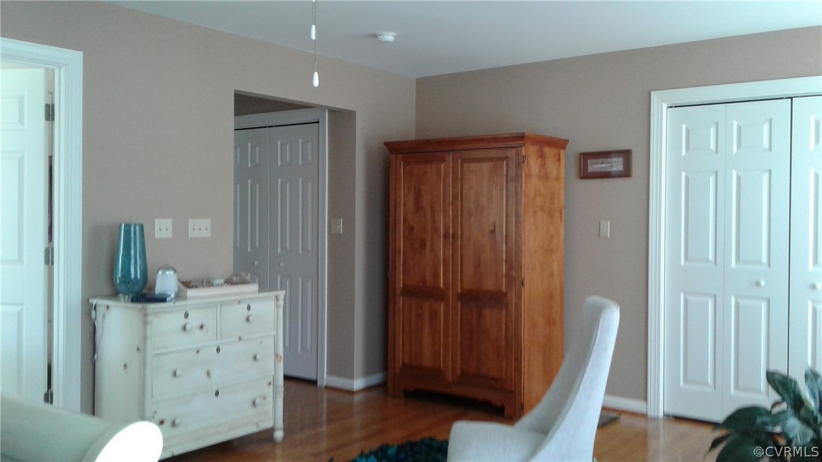 1863 Buffalo Road Dillwyn, VA 23936 - Photo 6 of 27 a view of a hallway with wooden floor and furniture