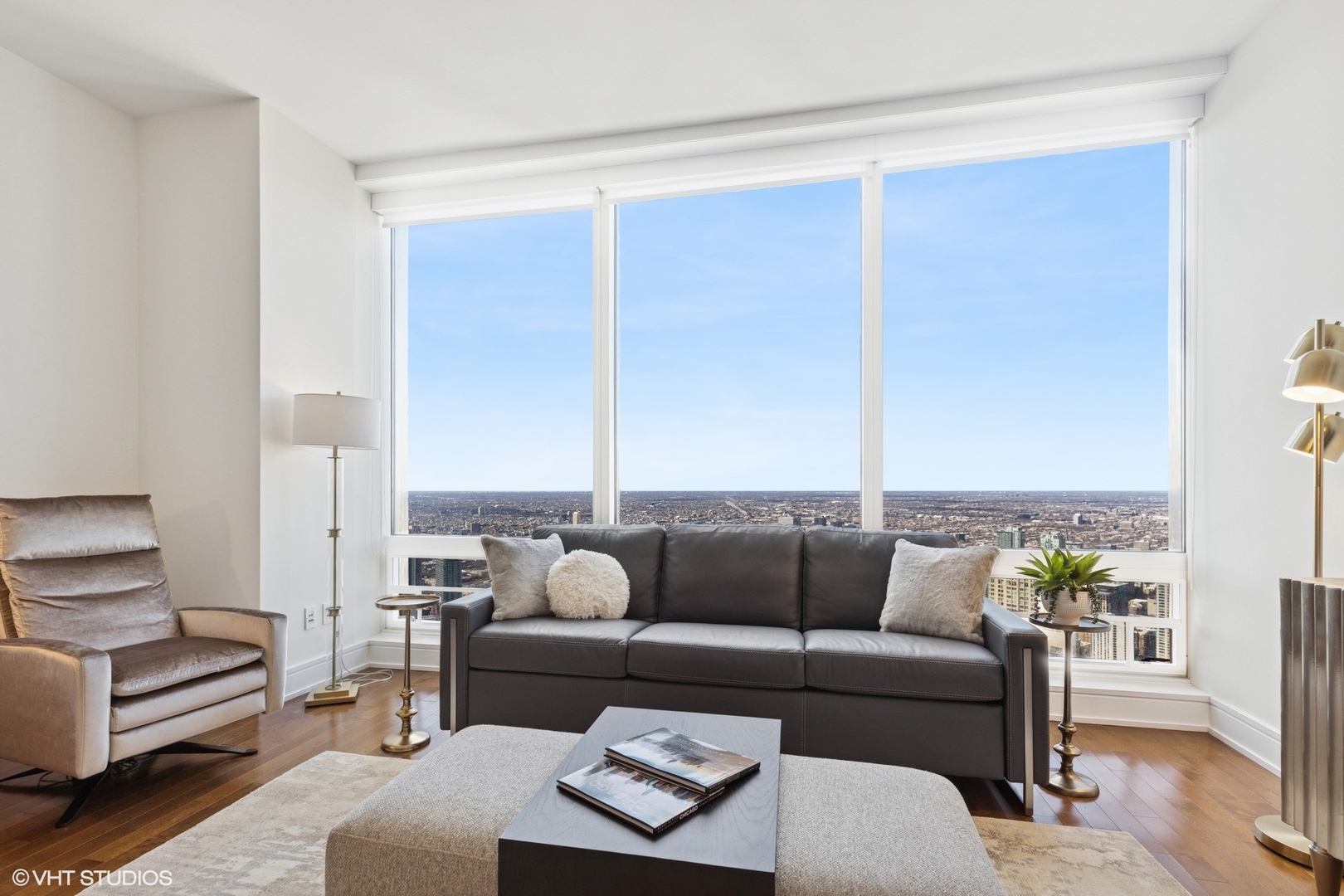 401 North Wabash Avenue, Unit 59B Chicago, IL 60611 - Photo 11 of 40 a living room with furniture and a potted plant