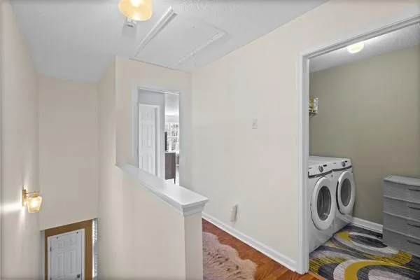 a utility room with dryer and washer