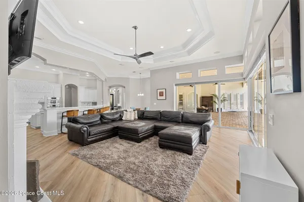 a bathroom with a granite countertop sink toilet and mirror