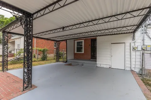 a view of swimming pool with a patio