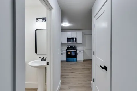 a bathroom with a sink double vanity and a mirror